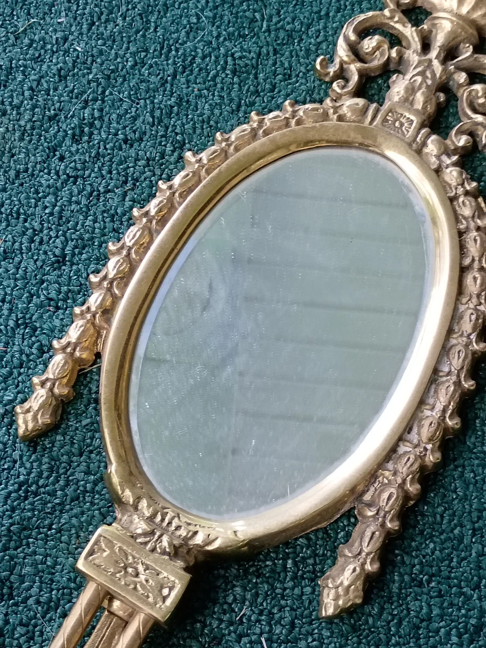 Ornate Gold Oval Wall Mirror with Twin Candle Holders